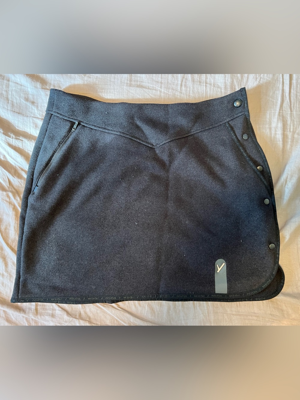 Classic Black Mini Skirt with Snap Accent